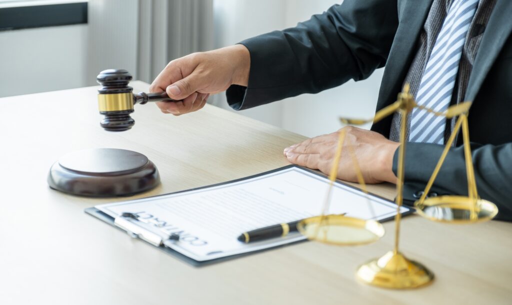 a person holding a gavel