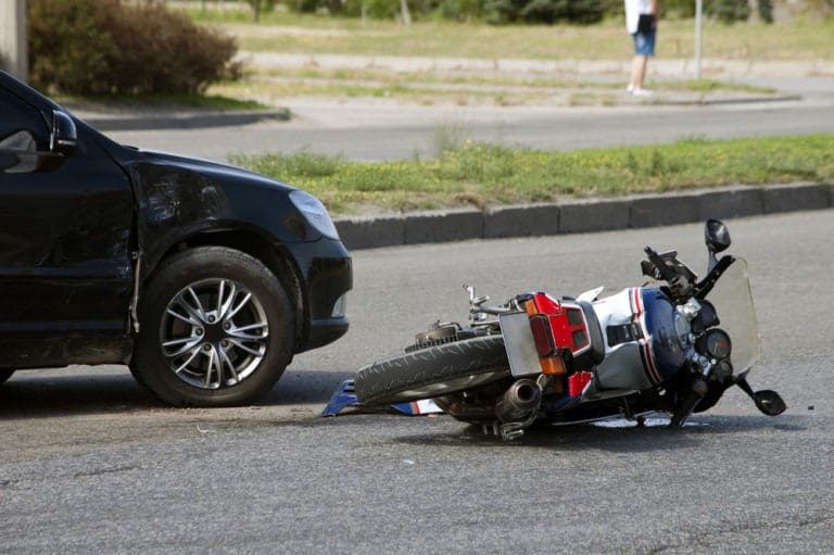 motorcycle in road after accident