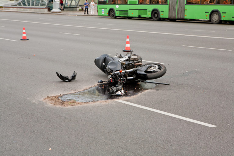 motorcycle crash on a city road