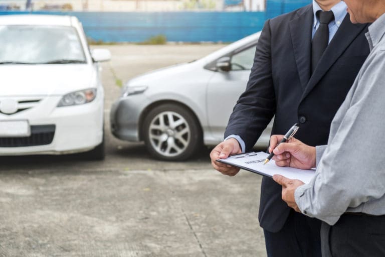 insurance agent at car accident