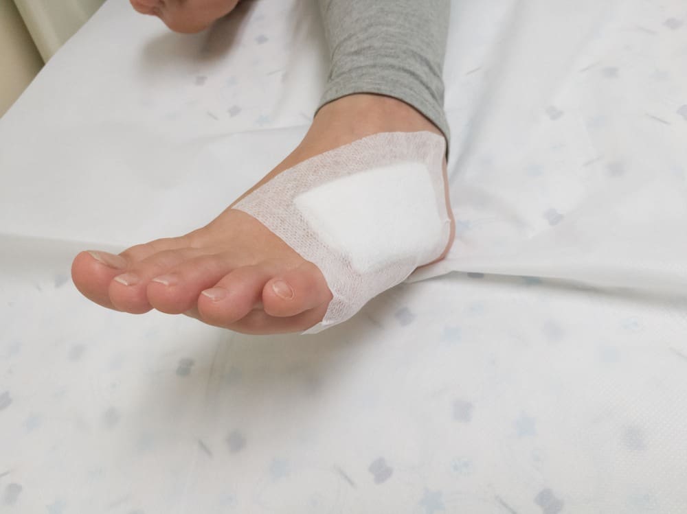person with bandaged foot