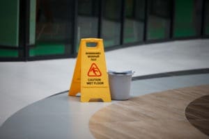 wet floor sign and bucket