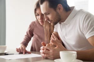 couple reviewing insurance papers