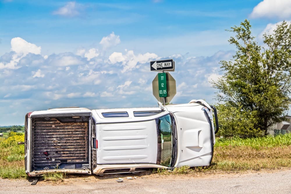 overturned pickup truck