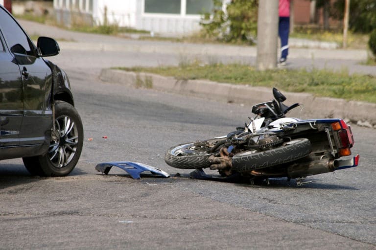 motorcycle crash on the road