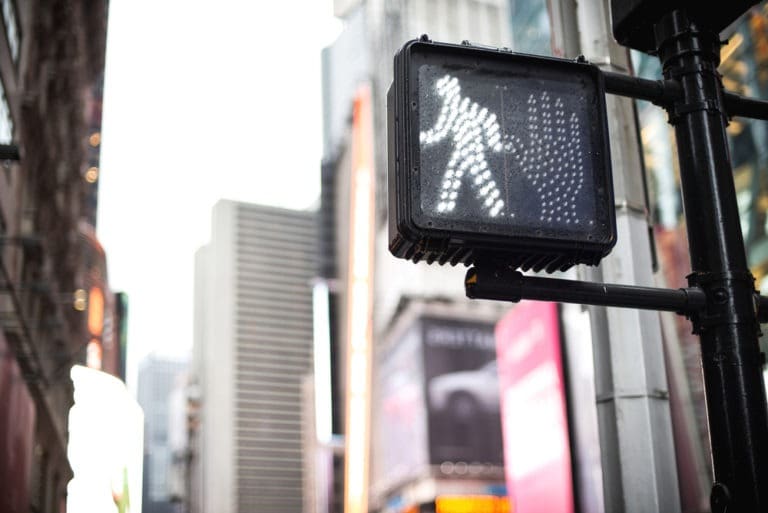 A Crosswalk Signal Showing A Walk Sign
