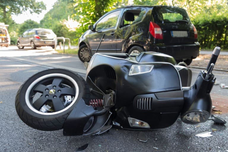moped-scooter-and-car-after-accident