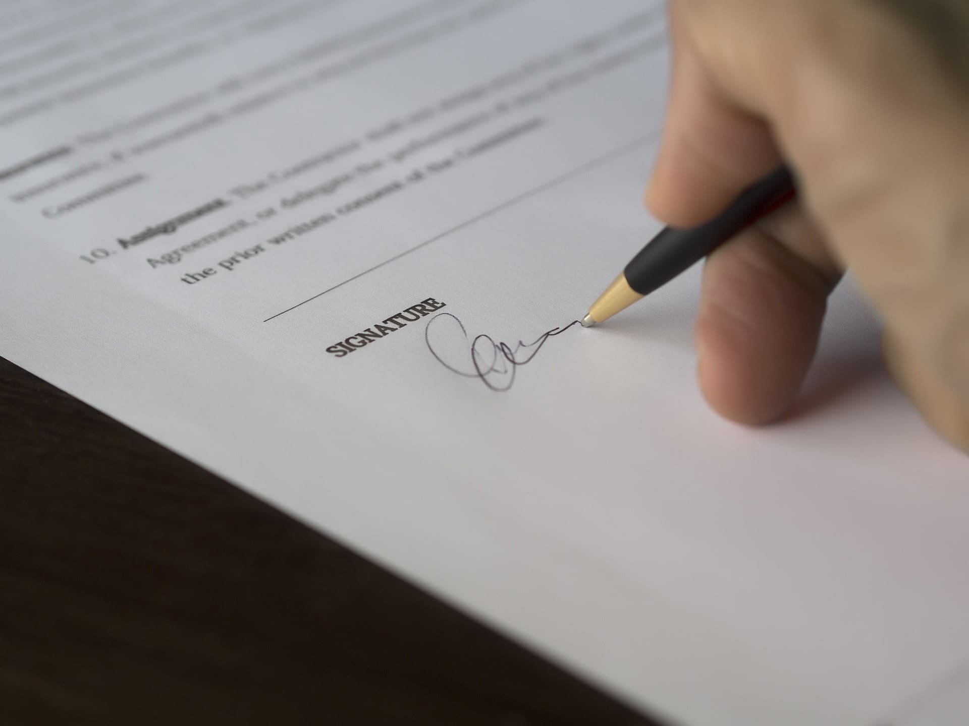 Person Signing a document