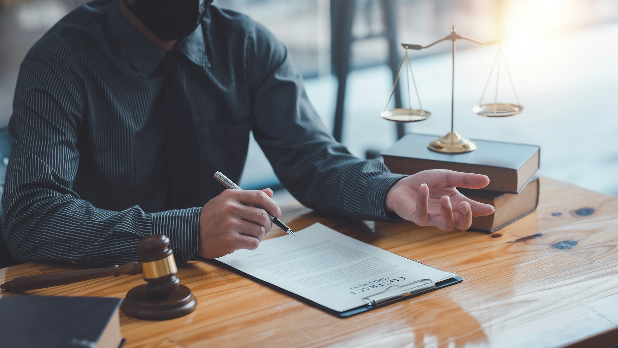 Lawyer discussing with client about contract, agreement, legal guideline, lawsuit. Lawyer work