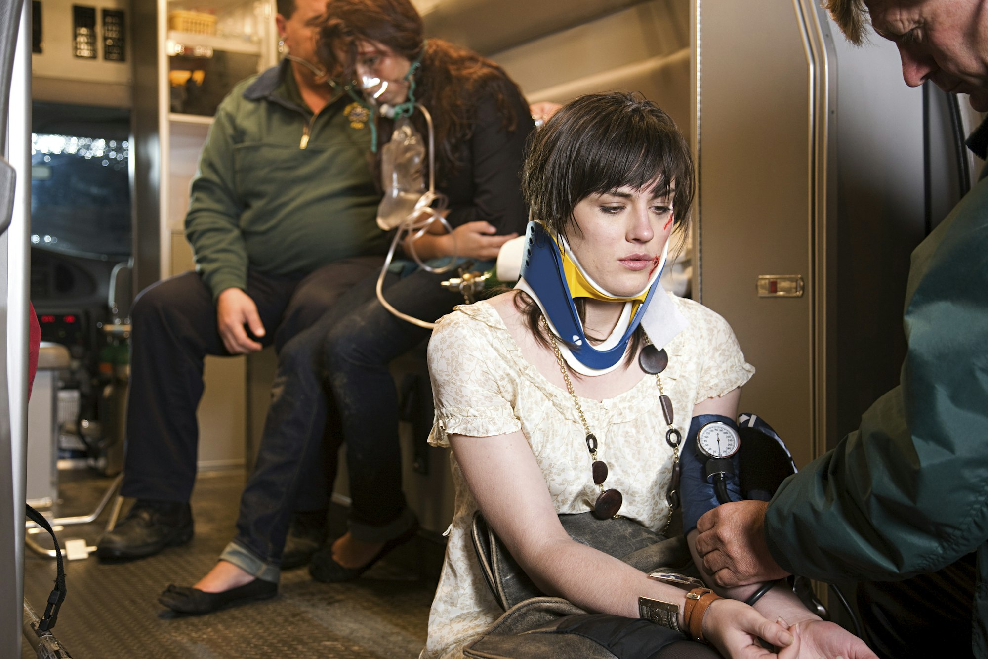 Young woman receiving medical attention