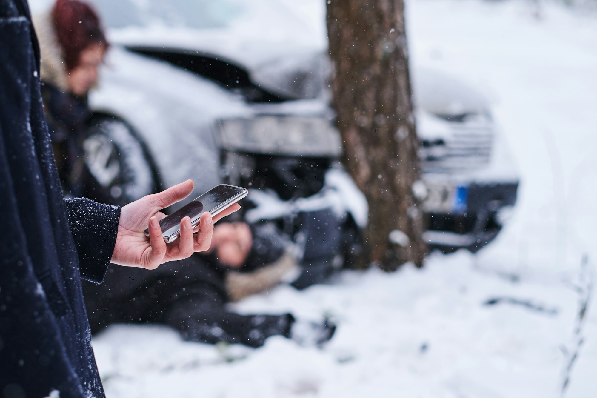Man is calling ambulance after car accident