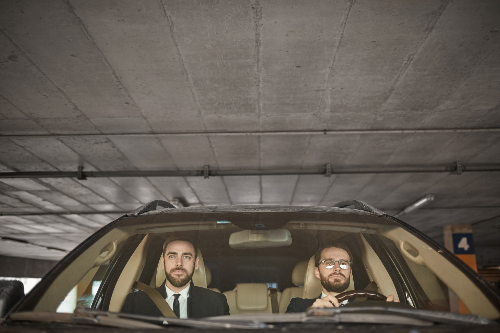 Business people sitting in the car in the parking
