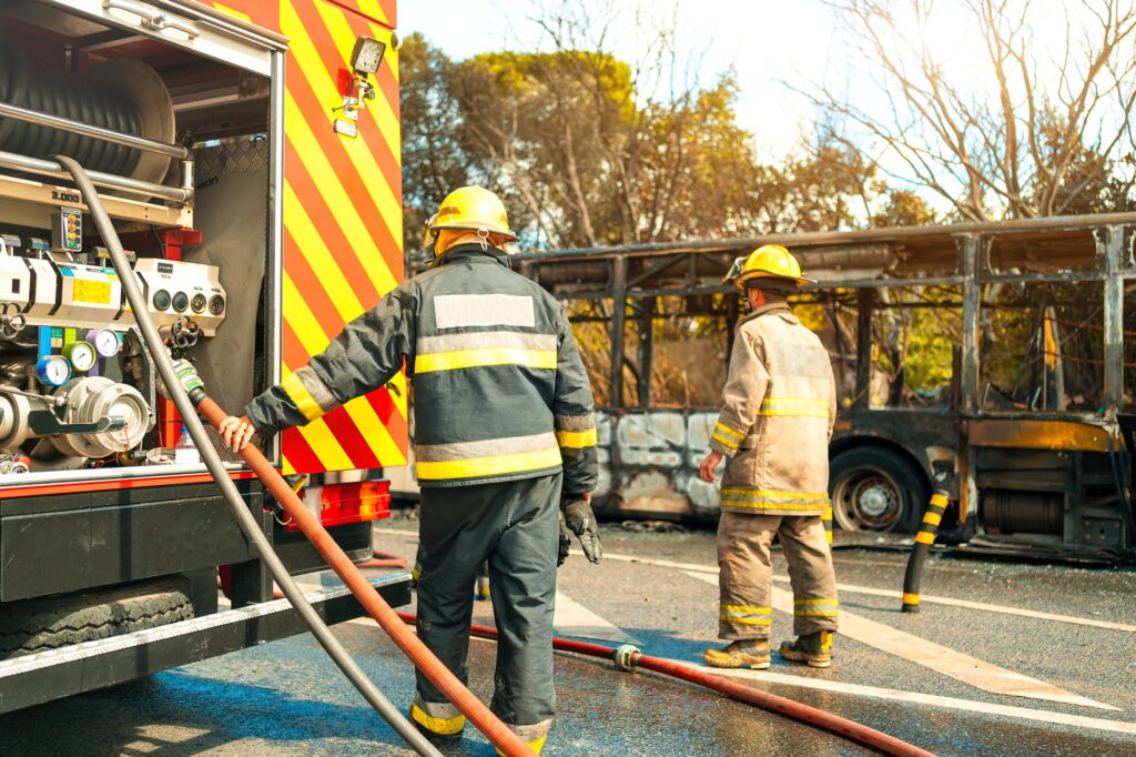Rescue Team of Firefighters Arrive on the Car Crash