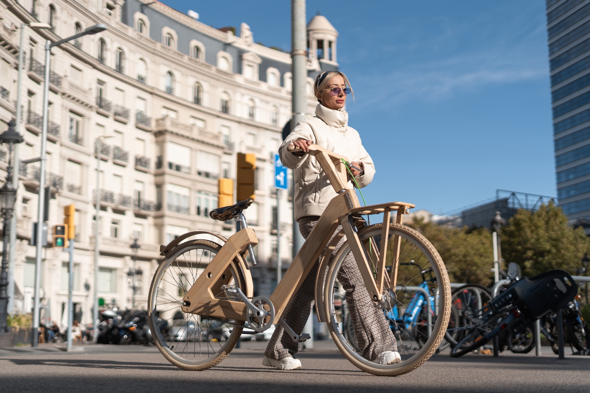 Woman with bike strolling in daytime